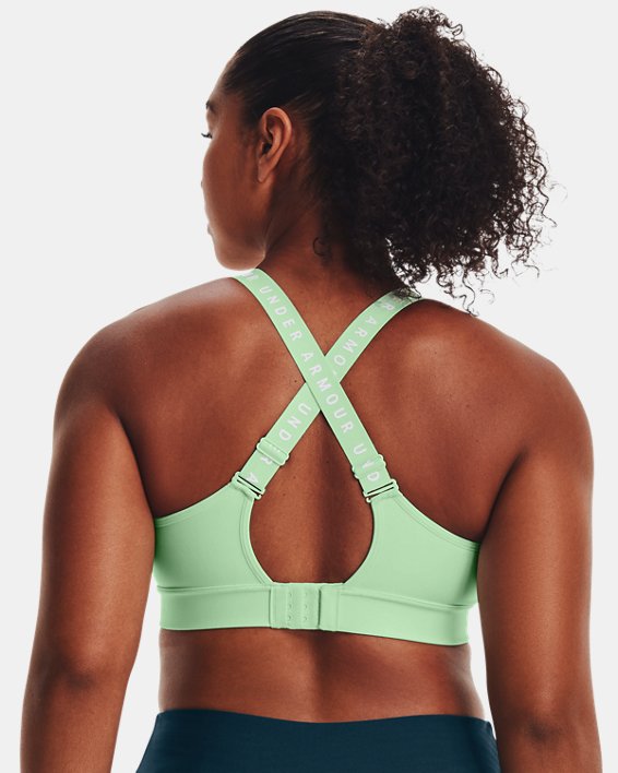 Women's UA Infinity Mid Covered Sports Bra in Green image number 6